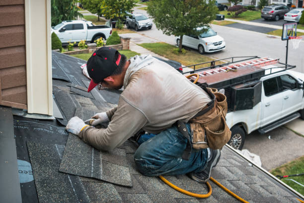 Professional Metal Roofing technician working in Sayville, NY